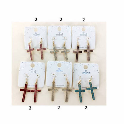 Set of cross-shaped earrings on 'mint' branded cards.