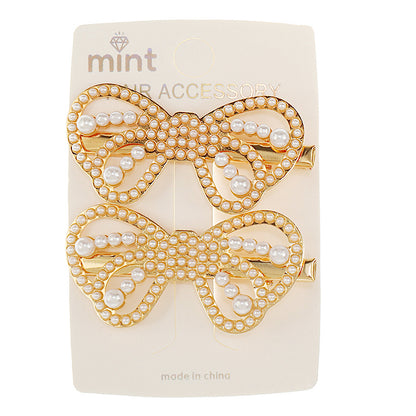 JH46853 - Pearl Bow Hair Clips