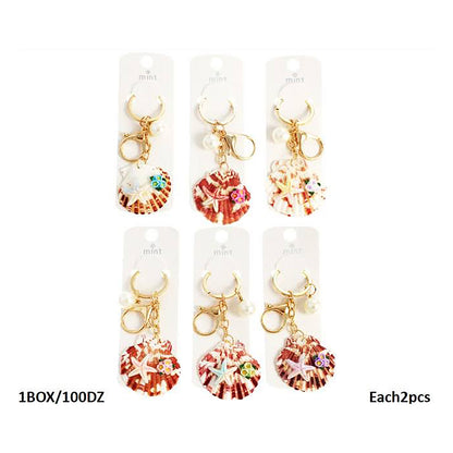 Starfish Charms On Speckled Shell Keychain