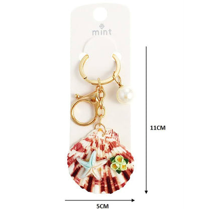 Starfish Charms On Speckled Shell Keychain